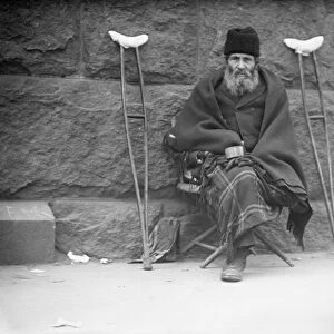 NYC: BEGGAR, 1922. A man begging in New York City. Photograph, 1922