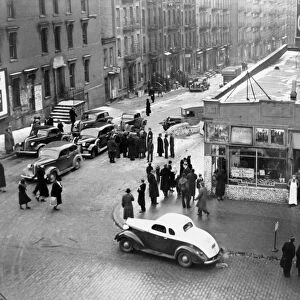 NYC: DRUG RAID, 1939. Treasury agents blockade a street with their cars before
