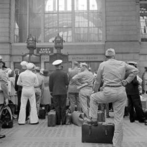 NYC: PENN STATION, 1942. Soldiers and sailors waiting for their train at Penn Station