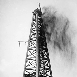 Oil derrick in a oil field in rural Oklahoma. Photograph, c1922