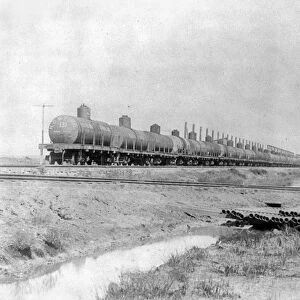Oil tank cars on a railroad near Spindletop oil field in Texas, c1901