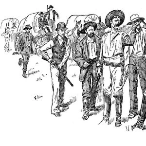OKLAHOMA BOOMERS, 1891. Private Dennis F. Fox of the 5th Cavalry holding off a group of boomers