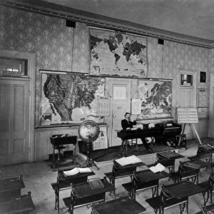 ONE-ROOM SCHOOLHOUSE. A classroom in a rural American one-room schoolhouse. Photograph