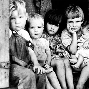 OZARK CHILDREN, 1940. Impovished children of a farmer in the Ozarks, Missouri