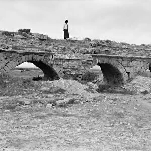 PALESTINE: ROMAN AQUEDUCT. Ancient Roman aqueduct at Caesarea, Palestine. Photograph