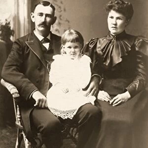 PARENTS AND CHILD, 1890s. Original cabinet photograph, St. Johnsbury, Vermont, 1890s