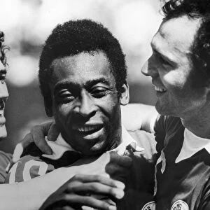 PELE & BECKENBAUER, c1977. New York Cosmos teammates Pele and Franz Beckenbauer (right). Photograph, c1977