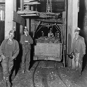 PENNSYLVANIA: COAL MINERS. Miners and a car full of coal in an coal mine in Scranton