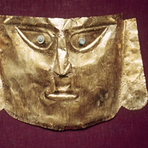 PERU: CHIMU GOLD MASK. Gold mummy mask made by the Chimu culture of ancient Peru, 13th to 15th century A. D