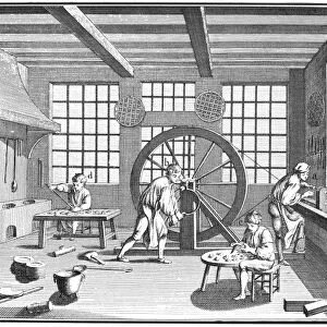 PEWTERWARE, 18th CENTURY. A French pewterers workshop with two men turning a vessel on a lathe (a, b); another shaping a hande (c); a hot soldering iron in use near the furnace by the window (d); and a molder pouring a ladle full of molten pewter. Line engraving, French, mid-18th century