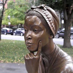 PHILLIS WHEATLEY (1753?-1784). African-American poet. Bronze, 2003, by Meredith Bergmann for the Boston Womens Memorial