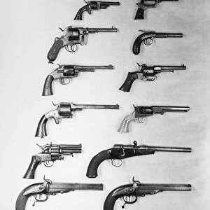 PISTOLS AND REVOLVERS. A selection of handguns