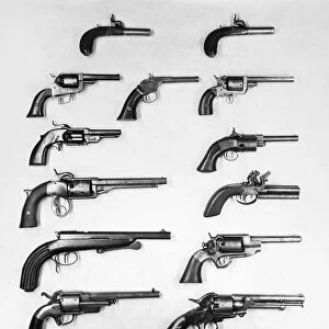 PISTOLS AND REVOLVERS. A selection of handguns