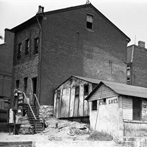 PITTSBURGH SLUM, 1938. Houses on The Hill, the slum section of Pittsburgh, Pennsylvania