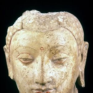 Polychrome stucco head of Buddha from Chinese Turkestan