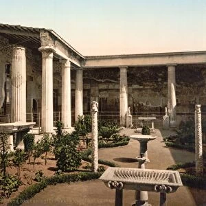 POMPEII: HOUSE. Peristyle of the House of the Vettii at the ancient Roman city of Pompeii, Italy
