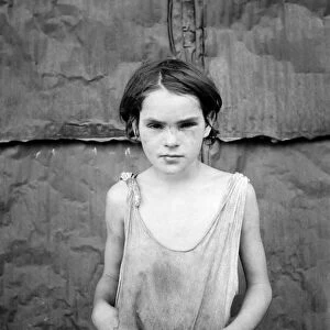 POVERTY: GIRL, 1936. An young girl living in a shantytown for migrant workers in Elm Grove