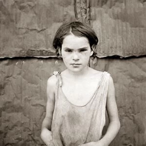 POVERTY: GIRL, 1936. A young girl living in a shantytown for migrant workers in Elm Grove