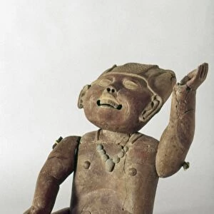 Pre-Columbian clay sculpture of a child with movable limbs and head, from Tierra Blanca, Veracruz, Mexico, 550-950 A. D