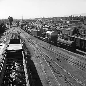 RAILROAD YARD, 1943. The Atchison, Topeka, and Santa Fe Railroad yard in Needles, California