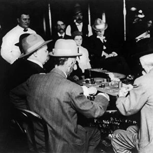 RENO: GAMBLING, 1910. Men gambling on a game of faro at a casino in Reno, Nevada, 1910