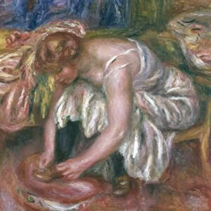 RENOIR: WOMAN, c1918. Pierre Auguste Renoir: Woman tying her shoe. Canvas, c1918