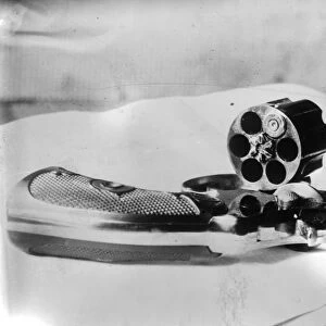 REVOLVER, 1912. Revolver used by John Flammang Schrank in an attempted assassination