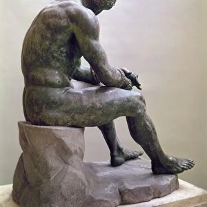 ROME: BOXER SCULPTURE. The Boxer of Quirinal, a Hellenistic Greek sculpture of a seated boxer, found on the Quirinal Hill in Rome in 1885. Bronze, 1st century B. C