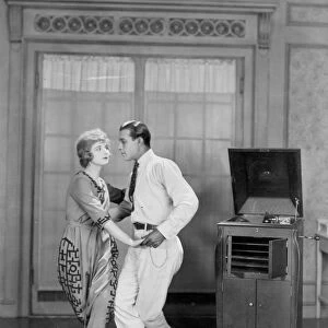 RUDOLPH VALENTINO (1895-1926). American (Italian-born) film actor. Valentino dancing the tango with Alice Terry, his leading lady in the 1921 film The Four Horsemen of the Apocalypse, c1923