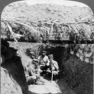 RUSSO-JAPANESE WAR, c1905. Four Japanese soldiers in the trenches near the Russian forts
