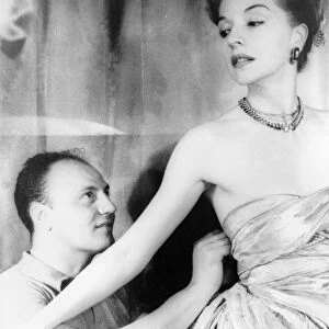 RUTH FORD (1911-2009). American actress, with French fashion designer Pierre Balmain