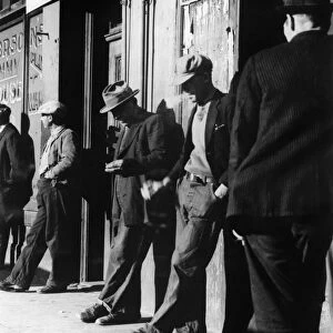 SAN FRANCISCO, 1934. Unemployed men in San Francisco, California. Photograph by Dorothea Lange