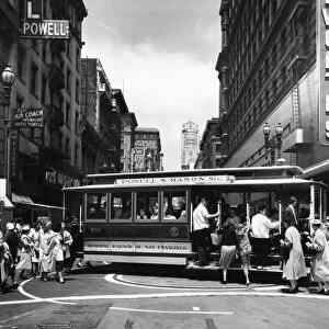 SAN FRANCISCO: CABLE CAR. A cable car on the turntable at the intersection of Powell and Market Streets in San Francisco, California. Photographed c1950
