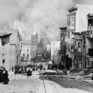 SAN FRANCISCO EARTHQUAKE. Crowd gathered on the street watching the city burn