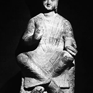 Seated stone figure of a bodhisattva, from the Yungang Grottoes, Shanxi province. Height: 51 in. Northern Wei, late 5th century A. D