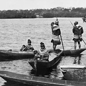 SEMINOLE CANOES, c1904. Seminole men, women and children in canoes on the Miami River, Florida