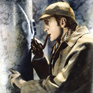 SHERLOCK HOLMES. Basil Rathbone (1892-1967), English actor, in the role of Sherlock Holmes. Oil over a photograph