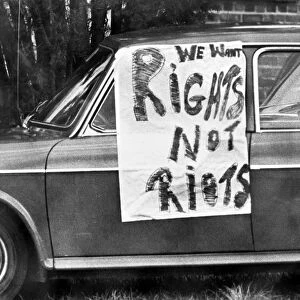 Sign on a car in Cape Town during riots that followed the Soweto uprising against the apartheid system, 1976