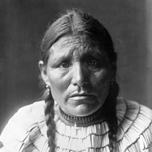 SIOUX WOMAN, c1907. Day Woman, a Sioux Native American woman. Photographed by Edward S