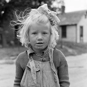 SOUTH DAKOTA: GIRL, 1939. A young girl in Sisseton, South Dakota. Photograph by John Vachon