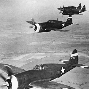 A squadron of Republic P-47 Thunderbolts, a U. S. Air Force single-seat fighter plane. Photographed 1943