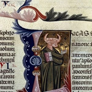 ST. LUKE WITH HEAD OF AN OX. Illumination from an Italian Bible, c1300, for the