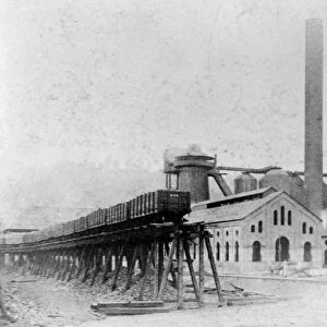 STEEL MILL, c1886. Blast furnaces at the Edgar Thomson Steel Works in Bessemer