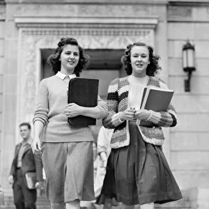 Students coming out of the library at Iowa State College. Ames, Iowa. Photograph by Jack Delano, May 1942