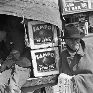 TEXAS: POTATO VENDOR, 1939. Potato peddler resting in the back of the truck at