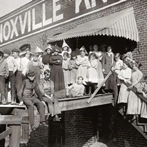TEXTILE MILL WORKERS, 1910. A group of workers standing in front of the Knoxville