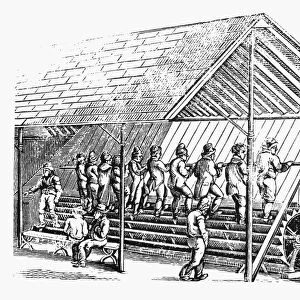 TREADMILL AT COTTON MILL. Men on the treadmill that provided the power in Samuel Slaters first cotton mill at Pawtucket, Rhode Island, in the early 1790s. Wood engraving, American, mid-19th century