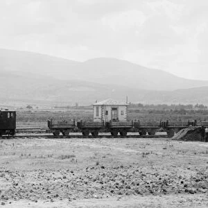 TURKEY: RAILROAD. Two locomotives pulling open cars on the railraod at Alexandretta