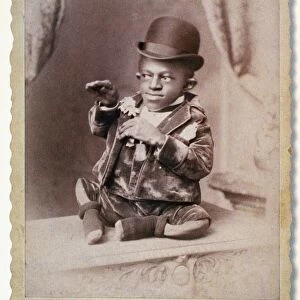 TURTLE BOY, c1895. George Williams, born with misshapen limbs and standing 18 inches tall
