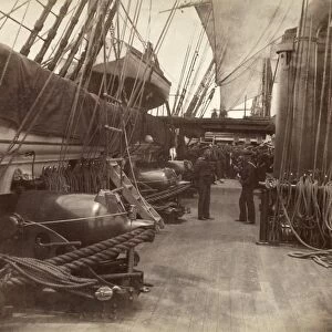 USS MOHICAN: GUN DECK, 1885. An argument among sailors on the gun deck of the steam